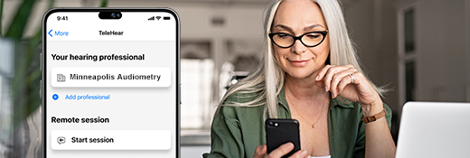 Image of woman on iPhone using TeleHear